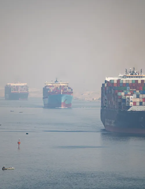 Many cargo ships navigating the Suez Canal, Egypt. 