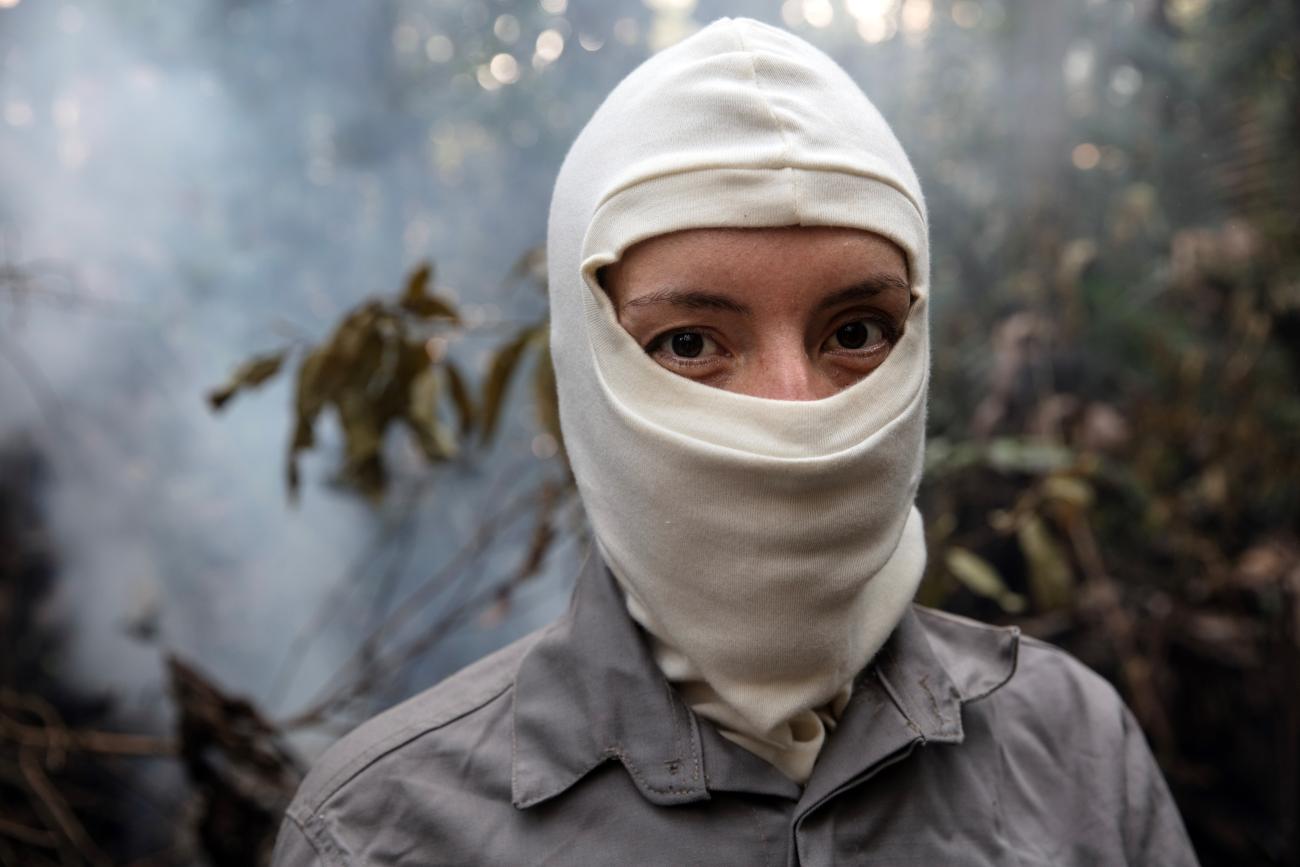 Dr Erika Berenguer, a Senior Researcher at the Environmental Change Institute in a burned area.