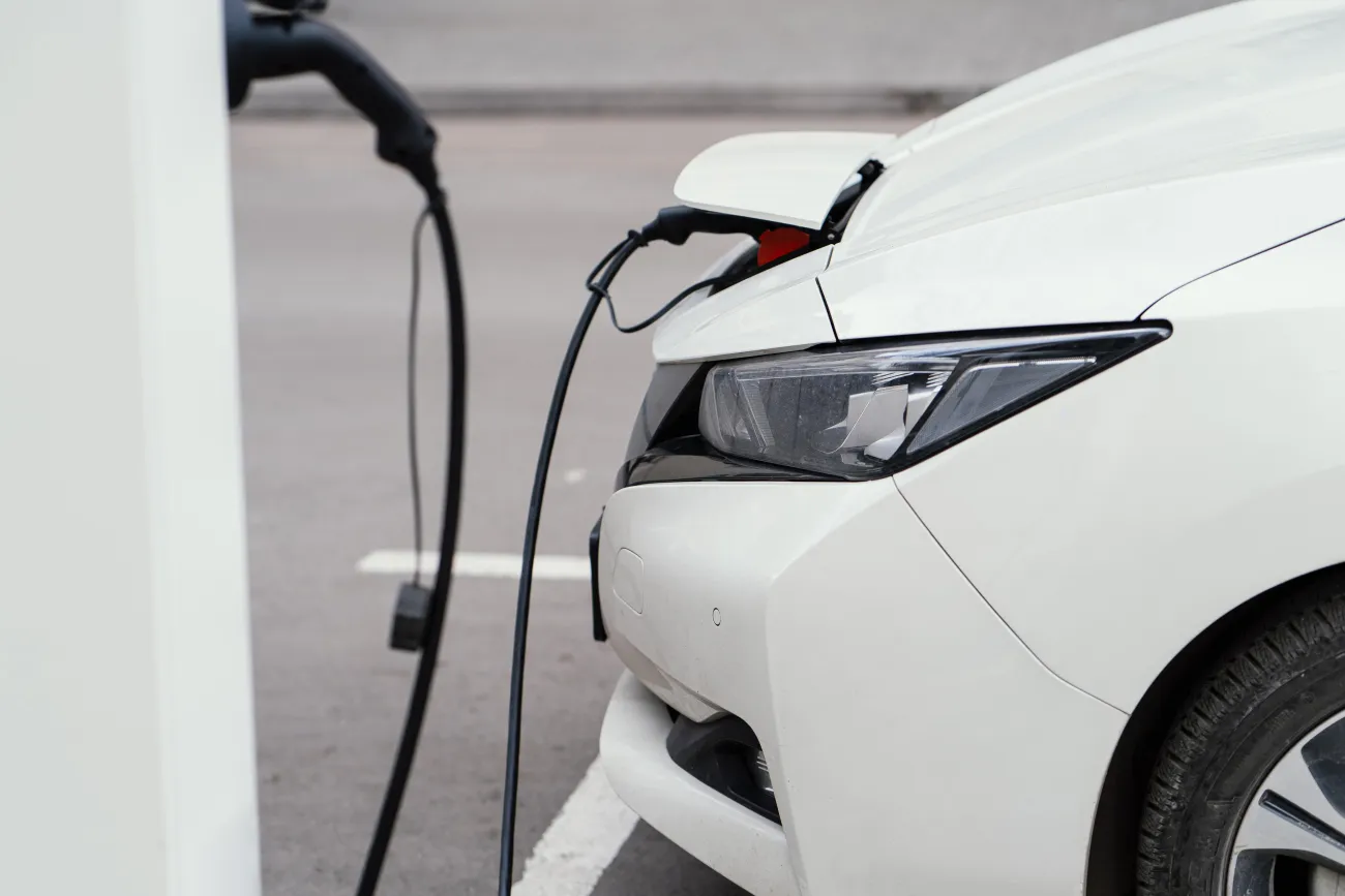 Car plugged in at charging point