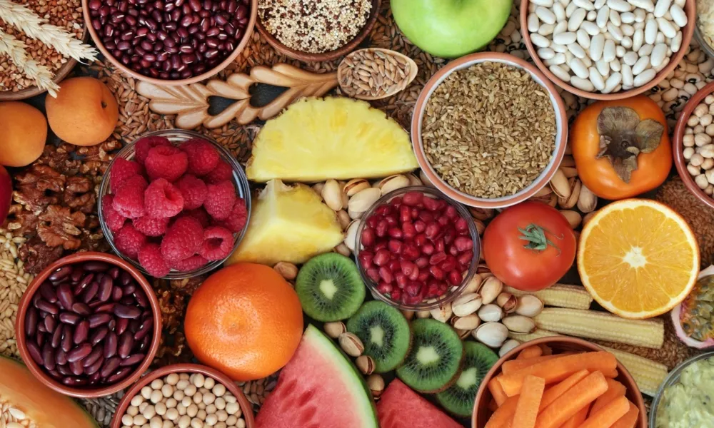 Bowls of fruits, seeds and legumes