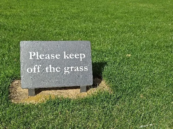 A 'keep off the grass' sign