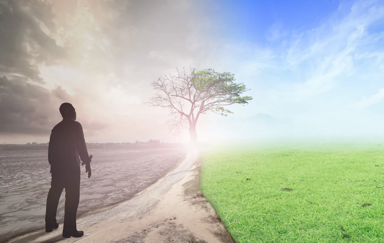 Human standing between climate worsened with good atmosphere