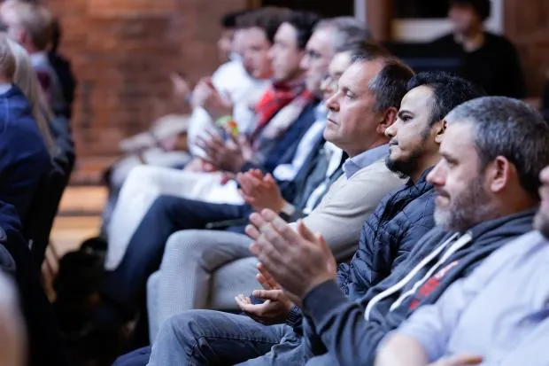 Audience members enjoying the lecture in Riddel Hall, Belfast