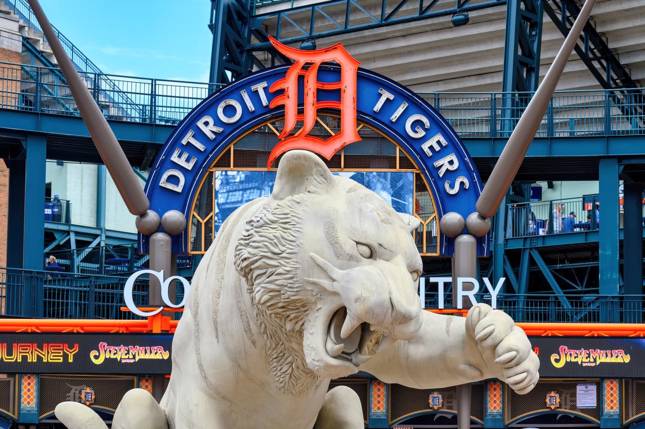 The entrance to the Detroit Tigers ground showing a stone tiger in front of their logo