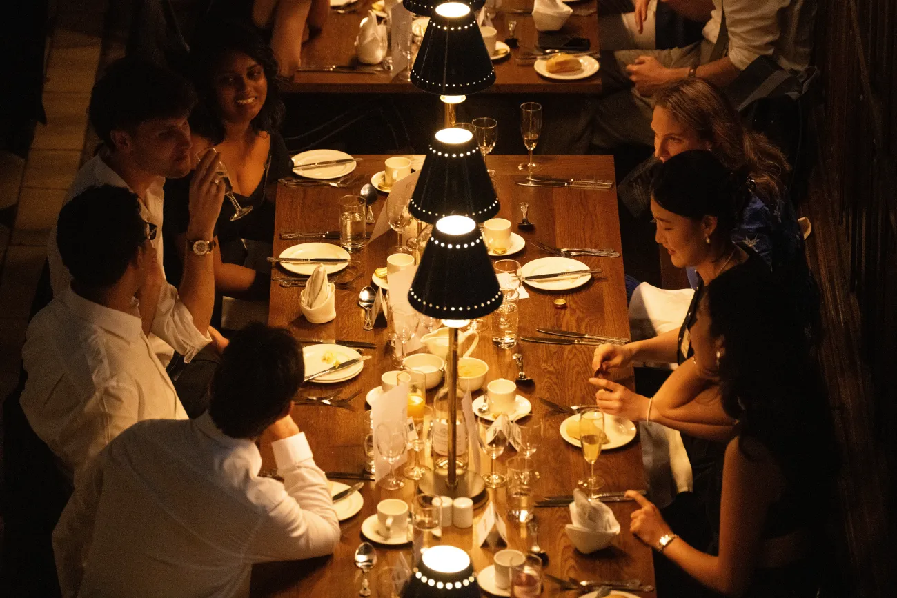 Overhead shot of the dining table with various courses being served