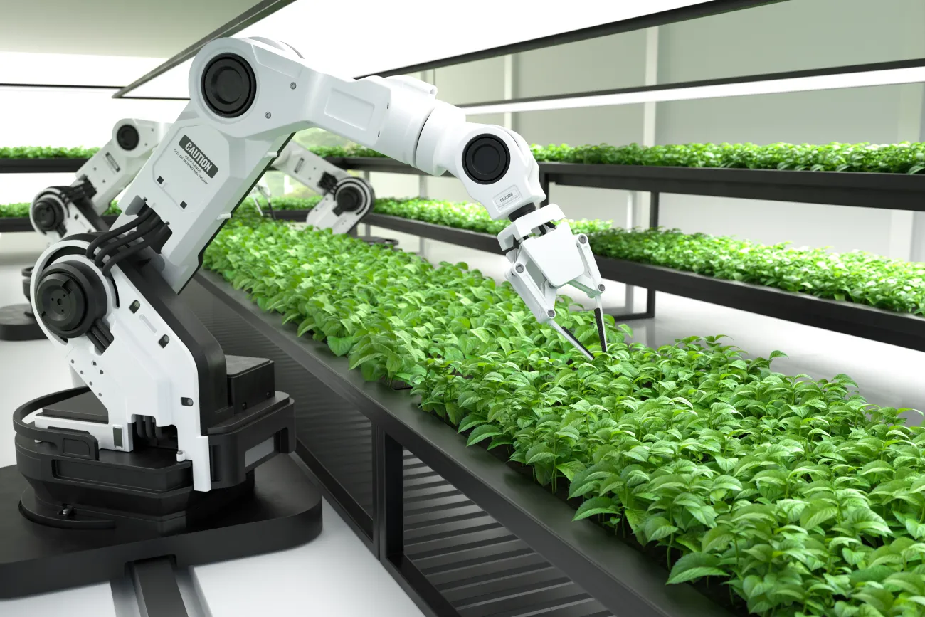Concept illustration of a futuristic farm with robots tending crops, representing the role of technology and automation in future food systems.