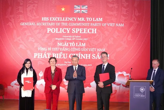Key members of the partnerships lined up on stage smiling