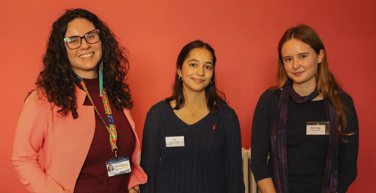 Claudia, Isha and Rosie stood together and smiling