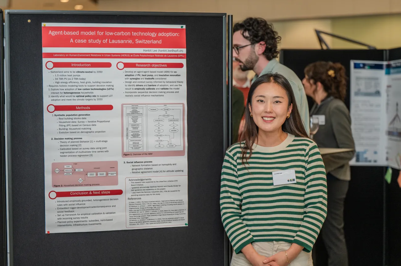 Poster competition entrant Hanbit next to her poster