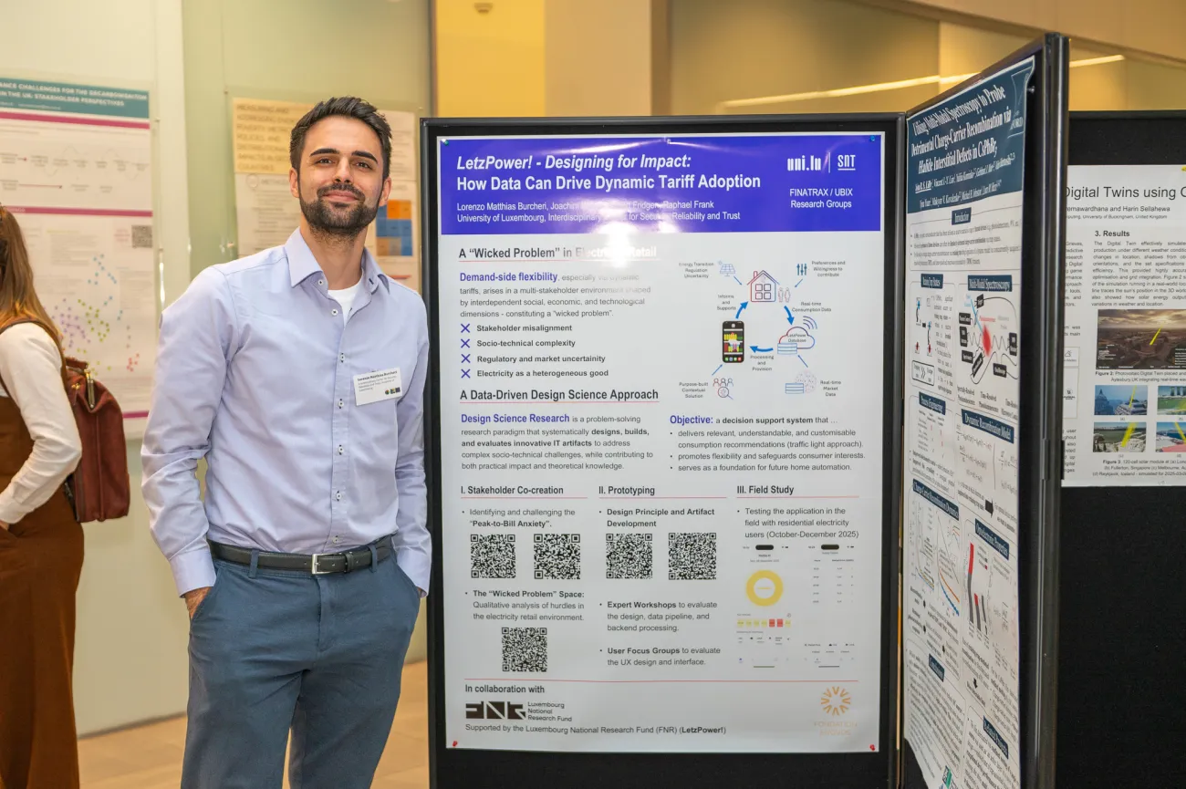 Poster competition entrant Lorenzo next to his poster
