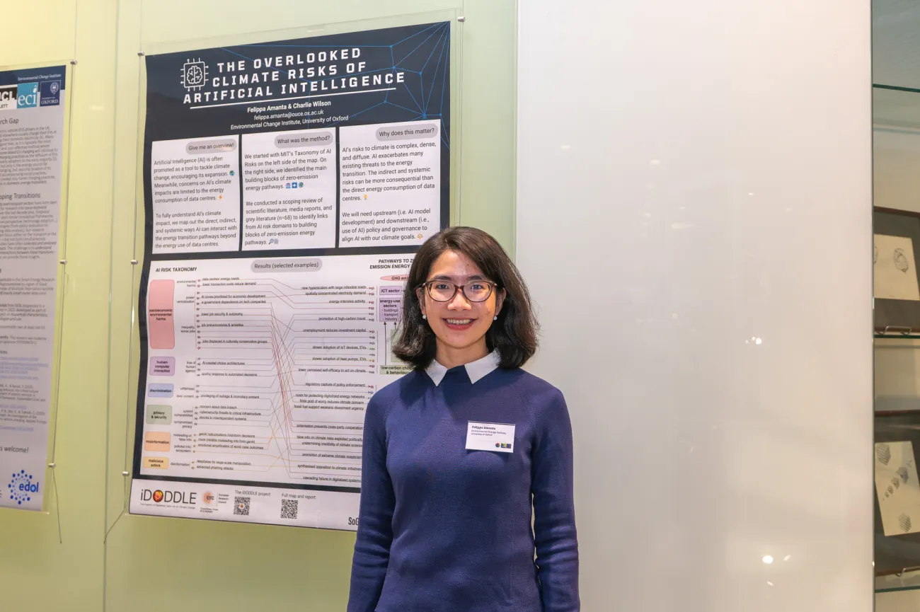 Poster competition entrant Pippa next to her poster