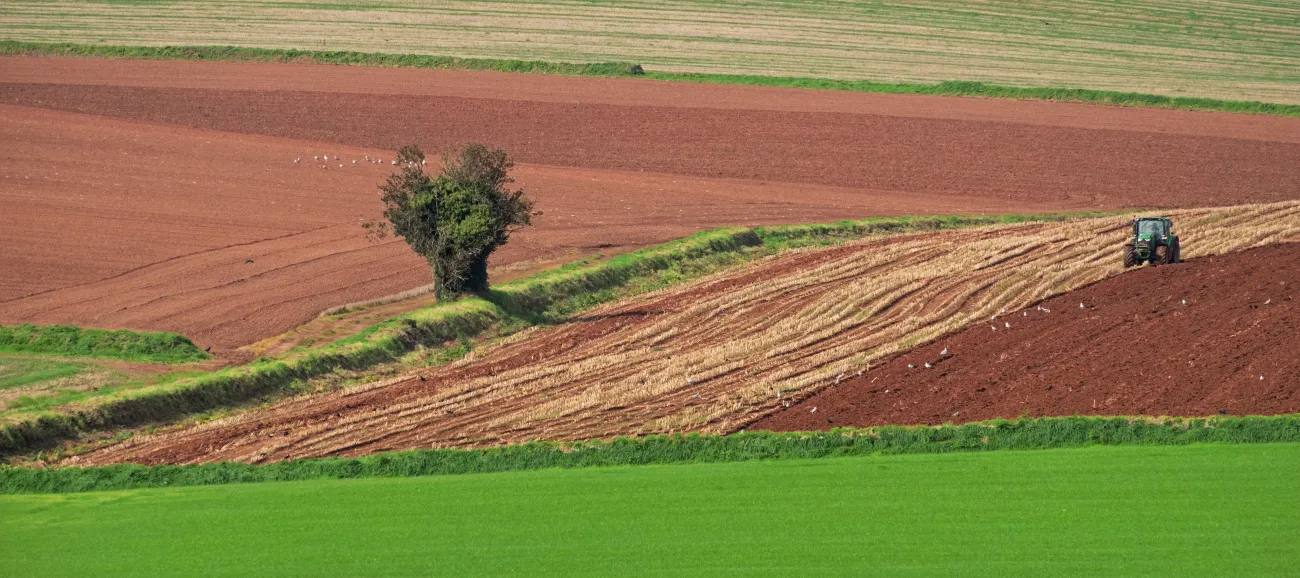 Tractor farming land in Devon