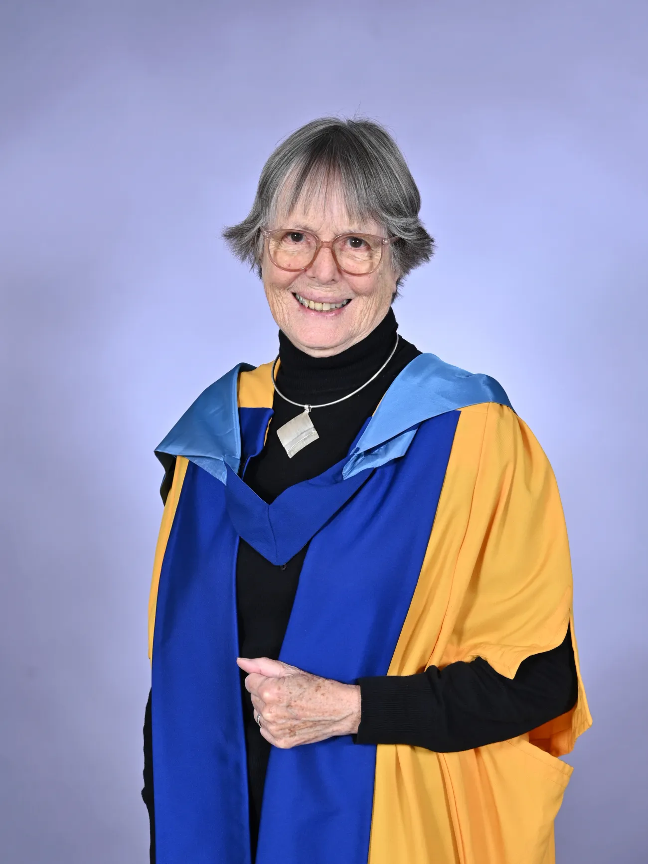 Dr Brenda Boardman wearing her Doctor of the University gown