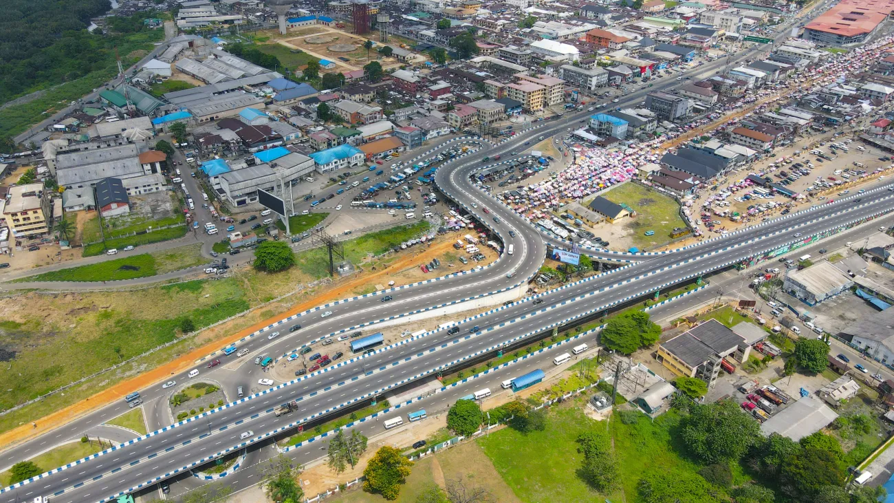 Aerial view of Mile One Market, in Port Harcourt, Nigeria showing the port, roads and buildings