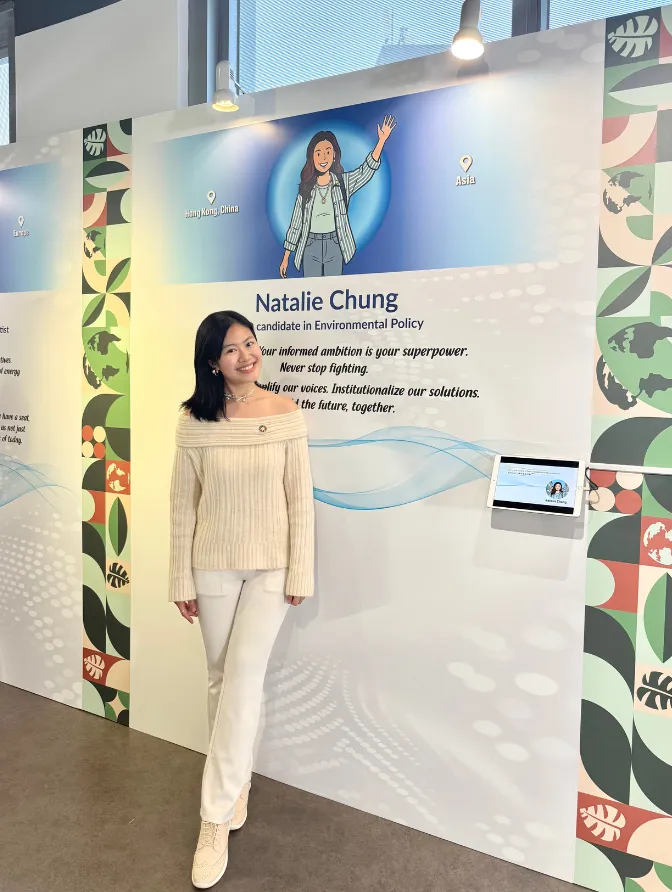 Natalie standing in front of her Ignite the Future exhibition