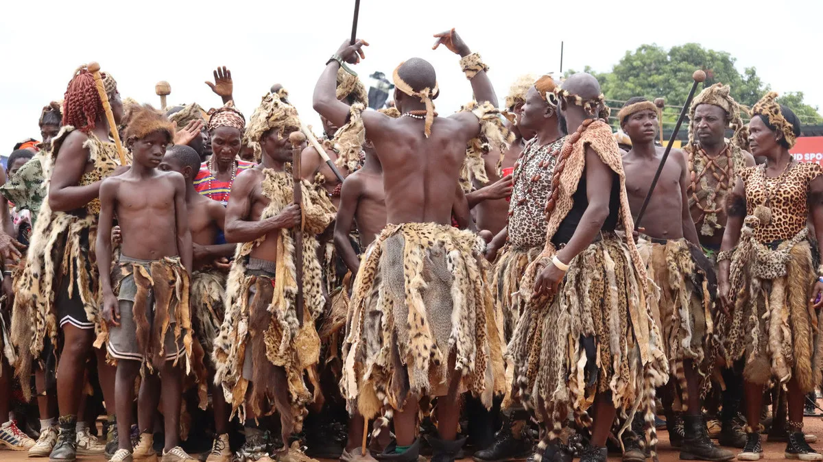 Tribal members old and young gathered together in leopard skin and other wildlife skin clothing at the 2025 Ncwala Traditional Ceremony of the Ngoni people in Eastern Zambia 