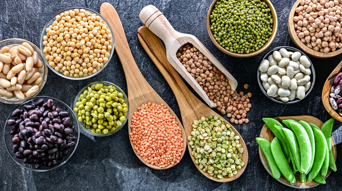 Selection of colourful different bean types in dishes