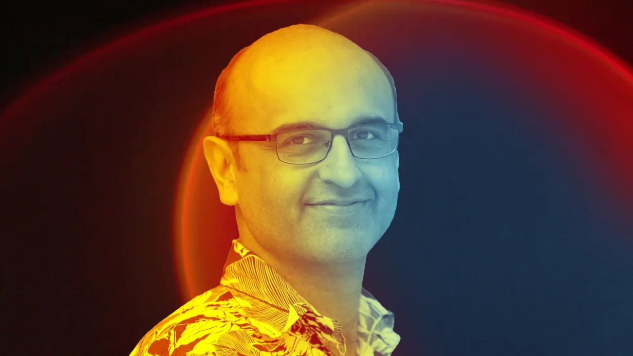 Professor Yadvinder in front of the ENDS Power List logo smiling