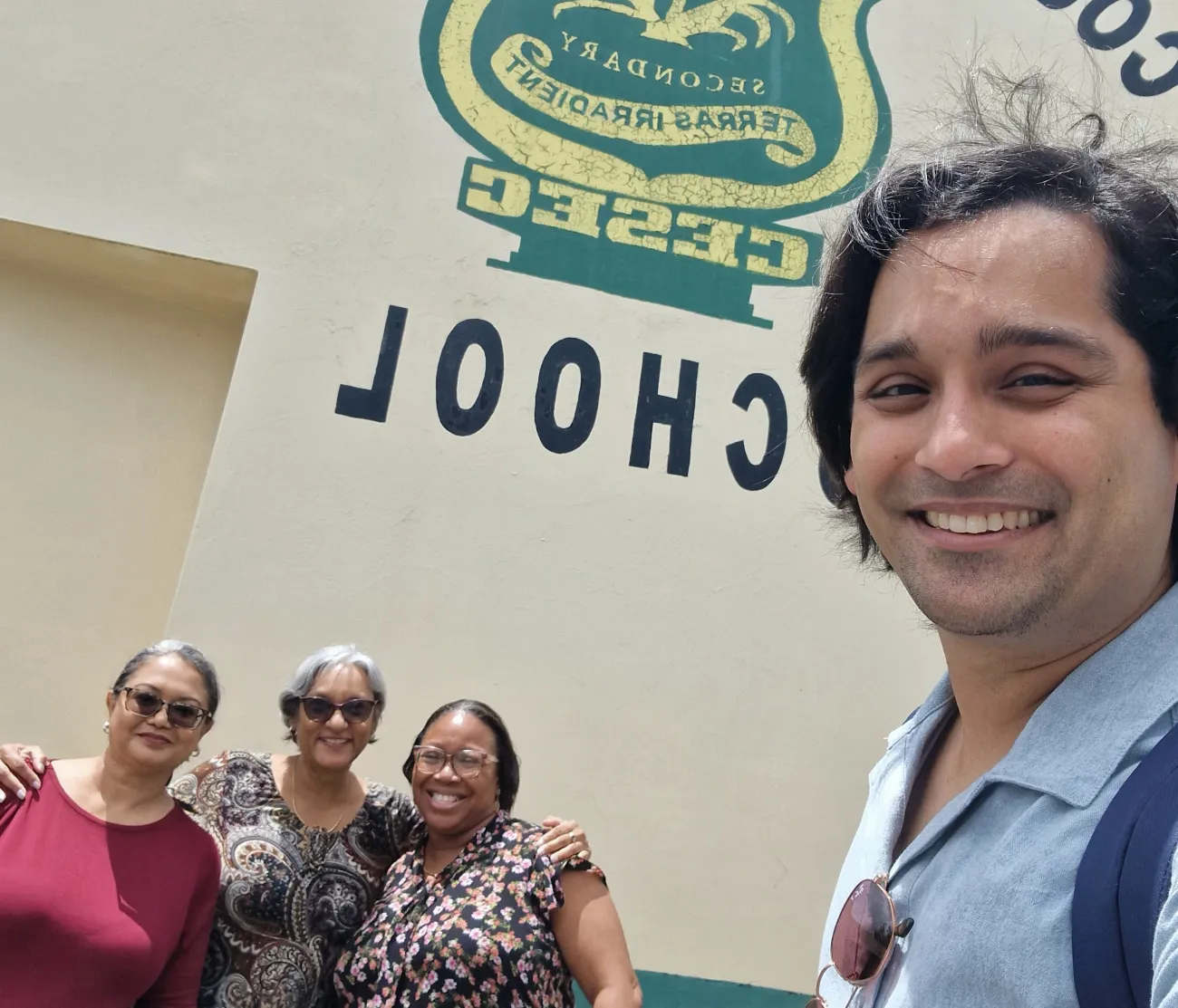 Dr Avidesh Seenath meeting his former teachers