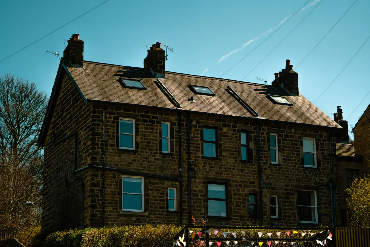 Block of older terraced homes with loft conversions