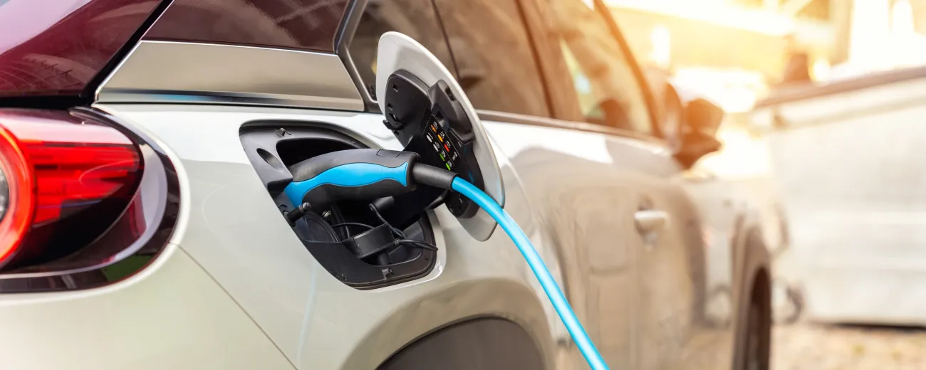 Close up of a car with the charger connected