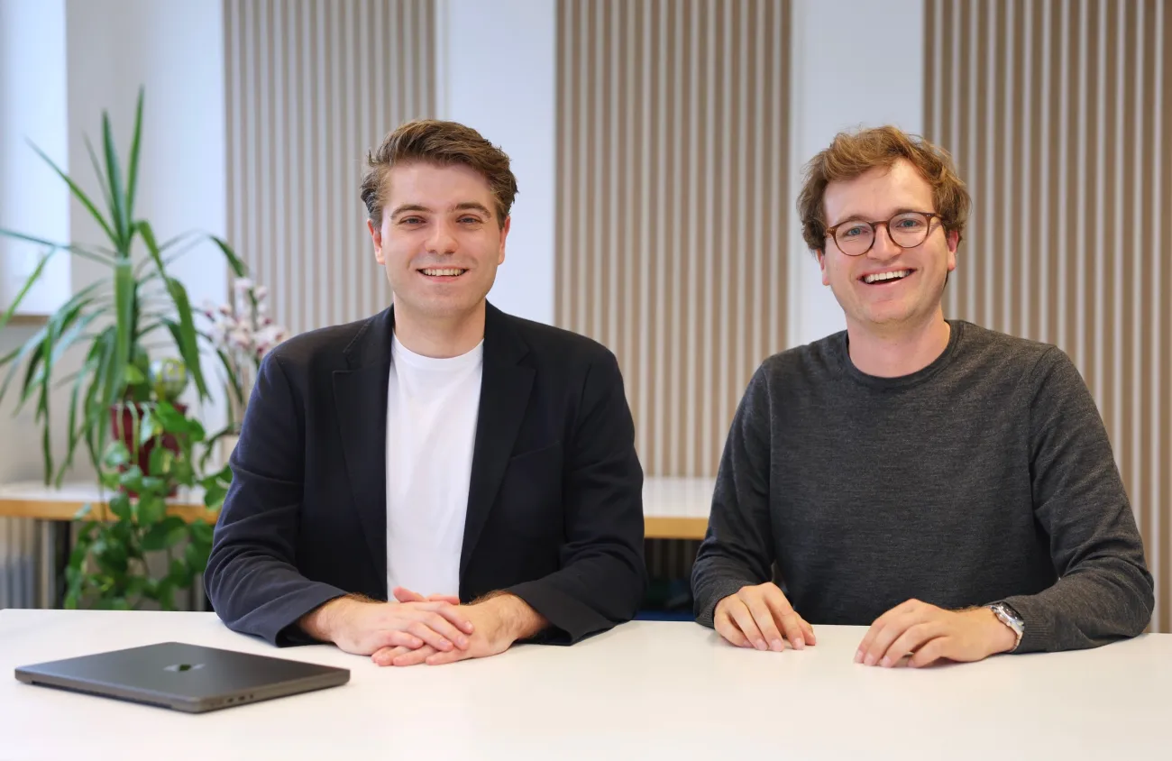 Dr Lukas Fieber and Konstantin Huneke sat together smiling