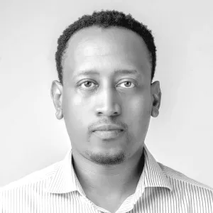 Profile photograph in black and white of Tedd Moya Mose