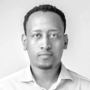 Profile photograph in black and white of Tedd Moya Mose