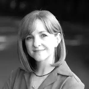 Head and shoulders image of Jennifer Lucey smiling