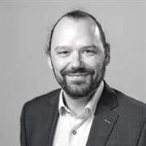 Dr Joerg Weber head and shoulders smiling 